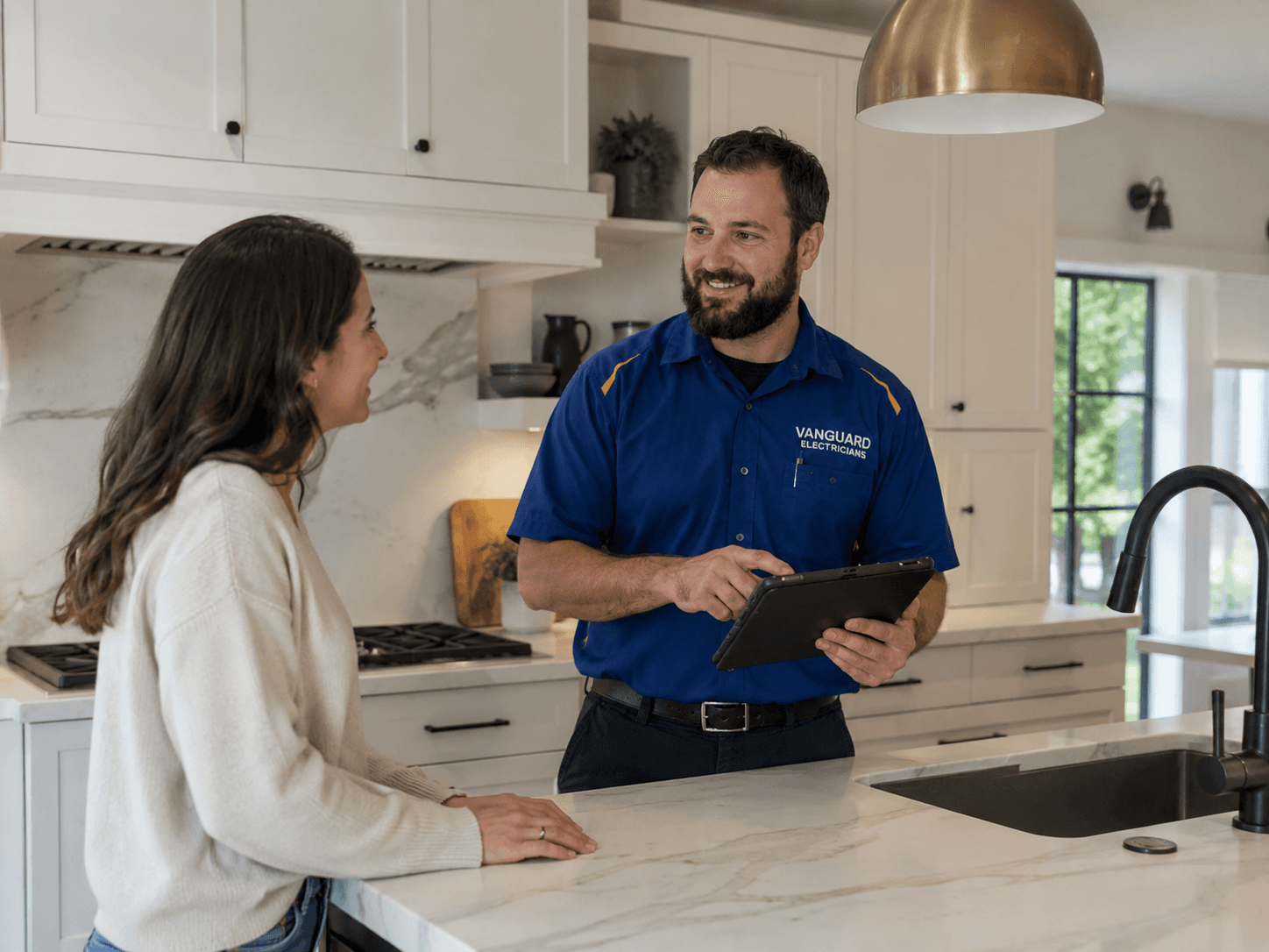 Vanguard electrician consulting with a homeowner